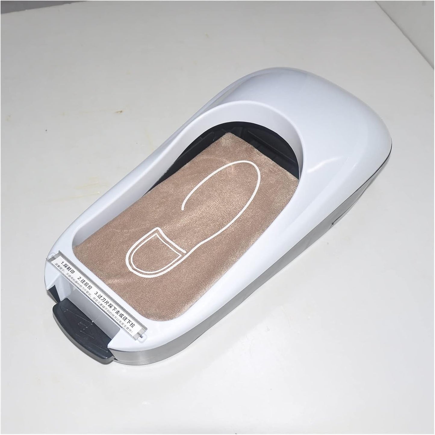 Car-Style Shoe Cover Dispenser ©